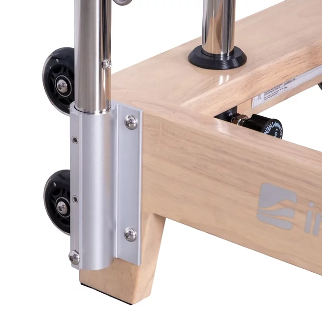 Wieża do reformera Pilates inSPORTline Driftaler ∙ nośność 100 kg ∙ drewniany drążek roll-down ∙ 8 sprężyn ∙ uchwyt V ∙ 53 oczka