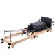 Reformer do pilatesu inSPORTline Driftaler ∙ nośność 120 kg ∙ rama dębowa ∙ składana ∙ z boxem w zestawie
