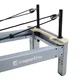 Reformer do pilatesu inSPORTline Oquiler ∙ system sprężynowy ∙ nośność 150 kg ∙ rama aluminiowa ∙ box w zestawie